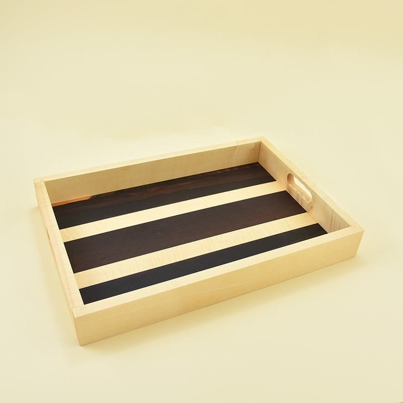 Wooden tray/Lesen pladenj Wooden tray made of maple wood and veneers of ziricote and maple /Lesen pladenj, narejen iz javorjovega lesa in furnirjev zirikote in javorja